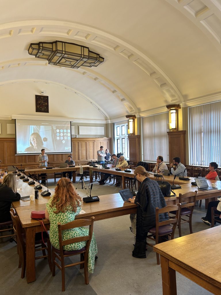 PANCOPOP Symposium room and presenters